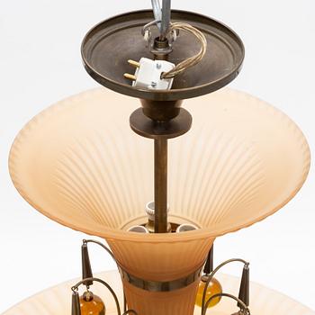 Harald Notini, a model '6658' glass and brass ceiling light, Arvid Böhlmarks Lampfabrik, 1930's.