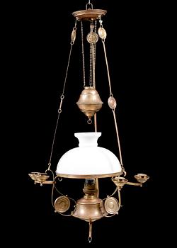 A jugend paraffin lamp, made for ceiling, beginning of the 20th century. Adjustable height ca 115- 140 cm.