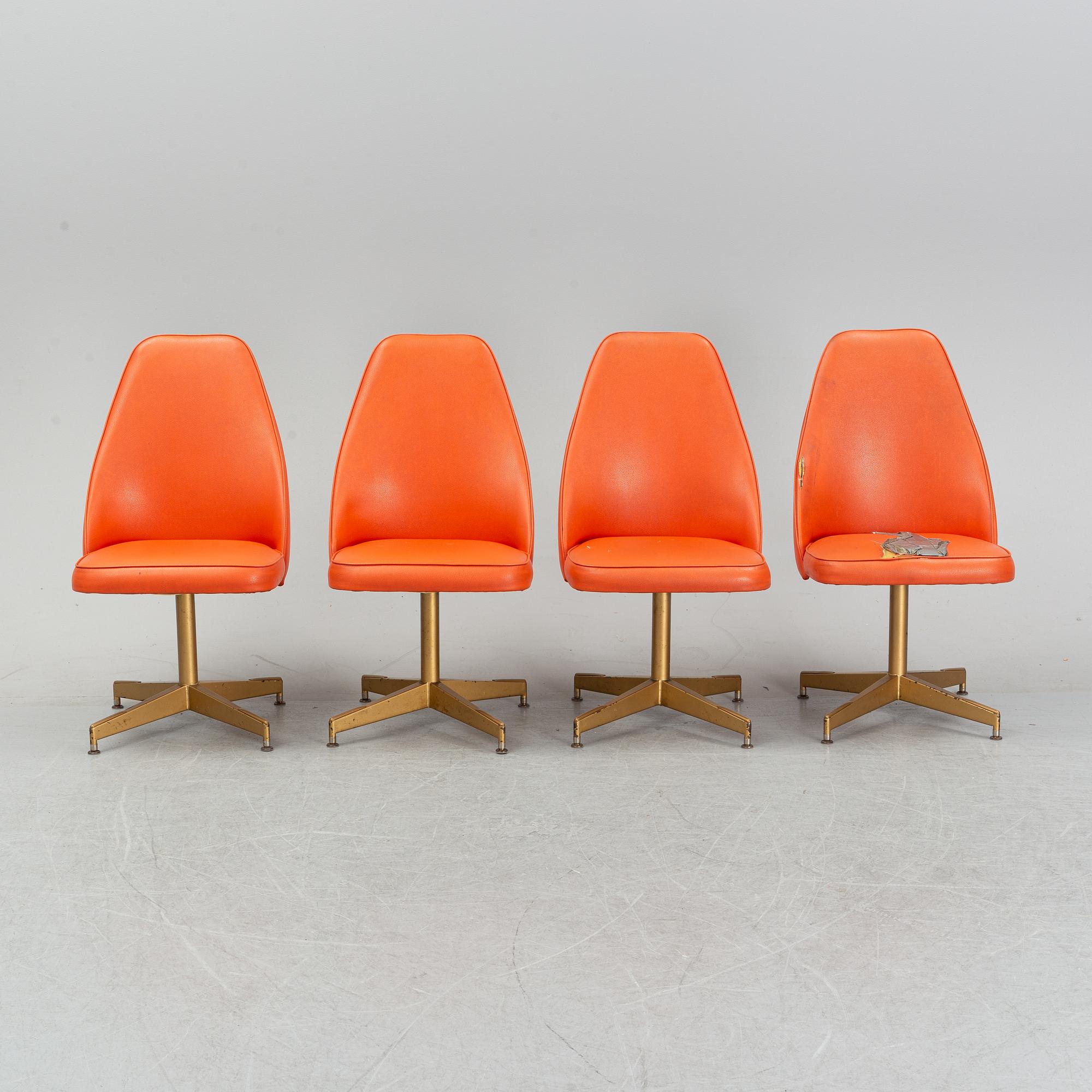 A dining table with four chairs, Walter of Wabash, table dated 1960.