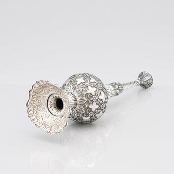 An 1880's british Raj repoussé silver rosewater sprinkler by Oomersi Mawji & Sons.