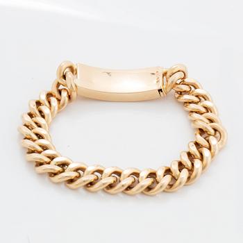 A 14K gold bracelet.