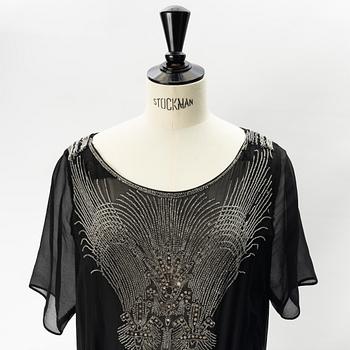 A 1920's pearl embroidered dress.