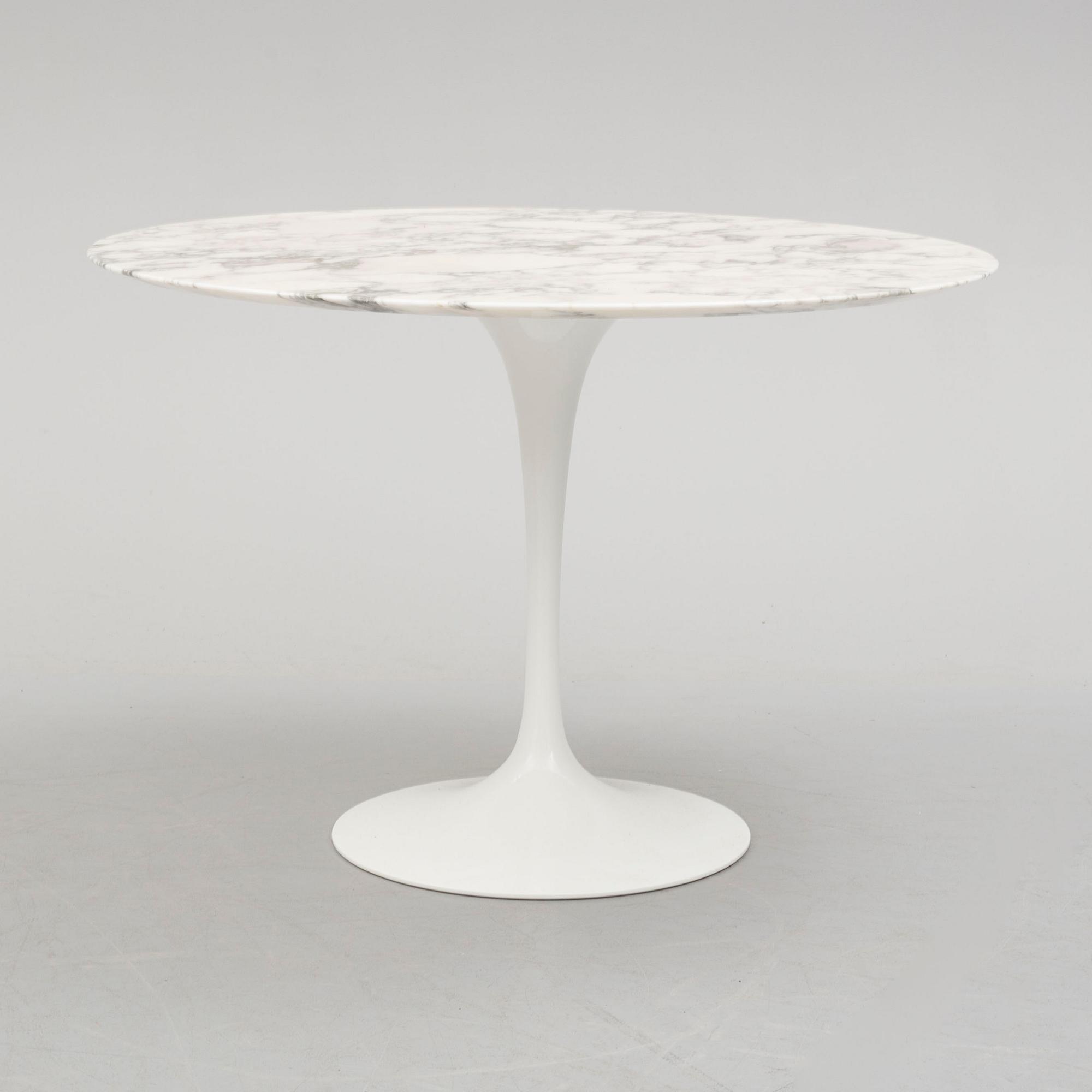 a 'Tulip' table by Eero Saarinen, Knoll Studio, 1956.