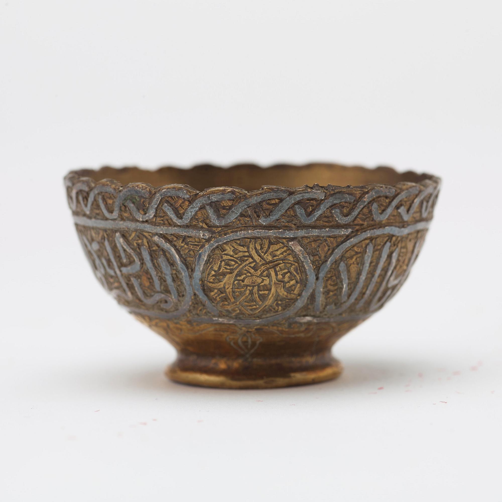 ZARFS, 12 PIECES. Metal. Height ca 3,5 cm each. Iran/Turkey, around 1900 - first half of the 20th century.