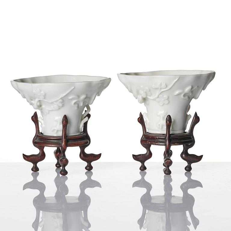 Two blanc de chine rhinoceros libation cups, Qing dynasty, Kangxi (1662-1722).