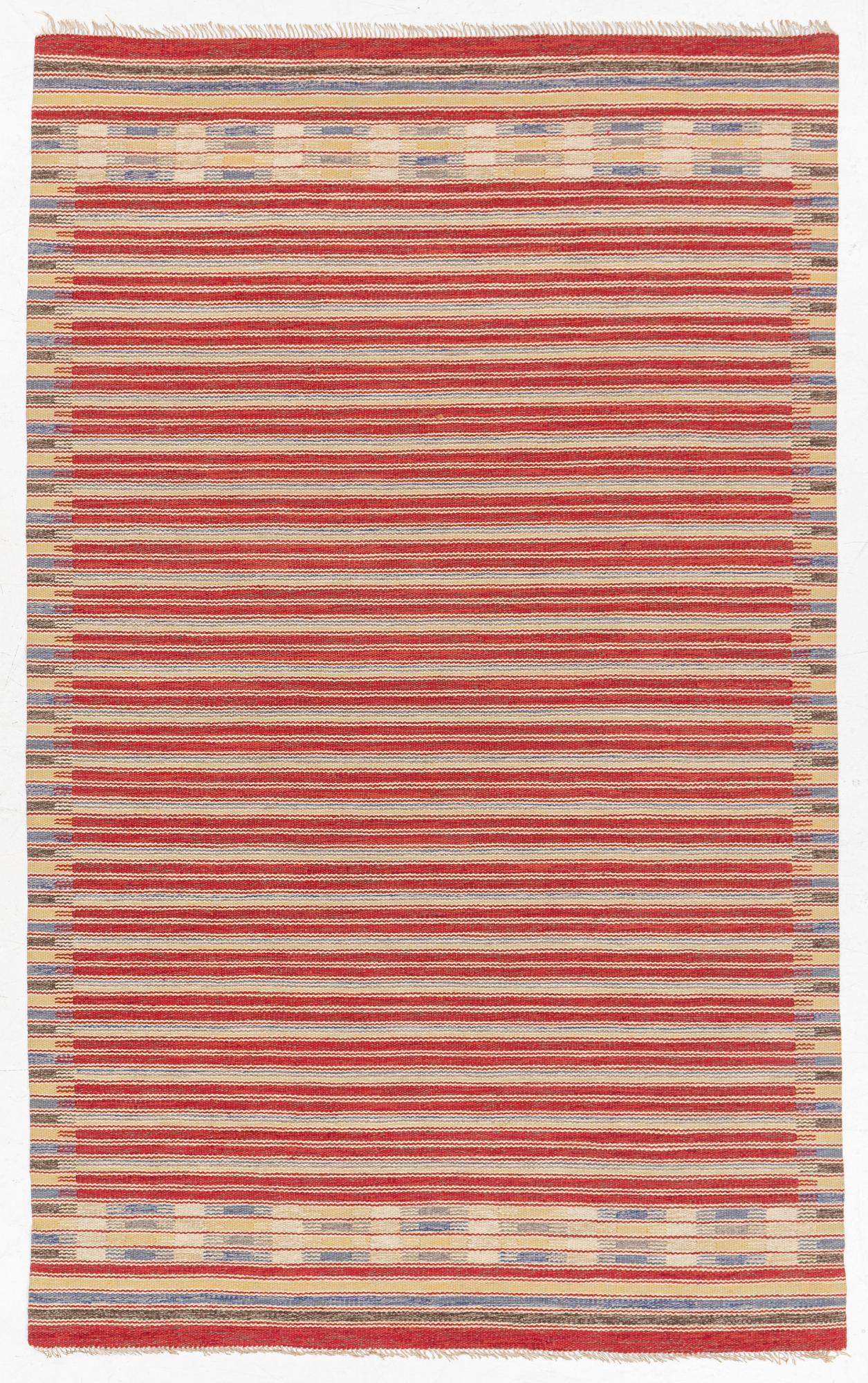 A flat weave carpet, c. 256 x 158 cm.