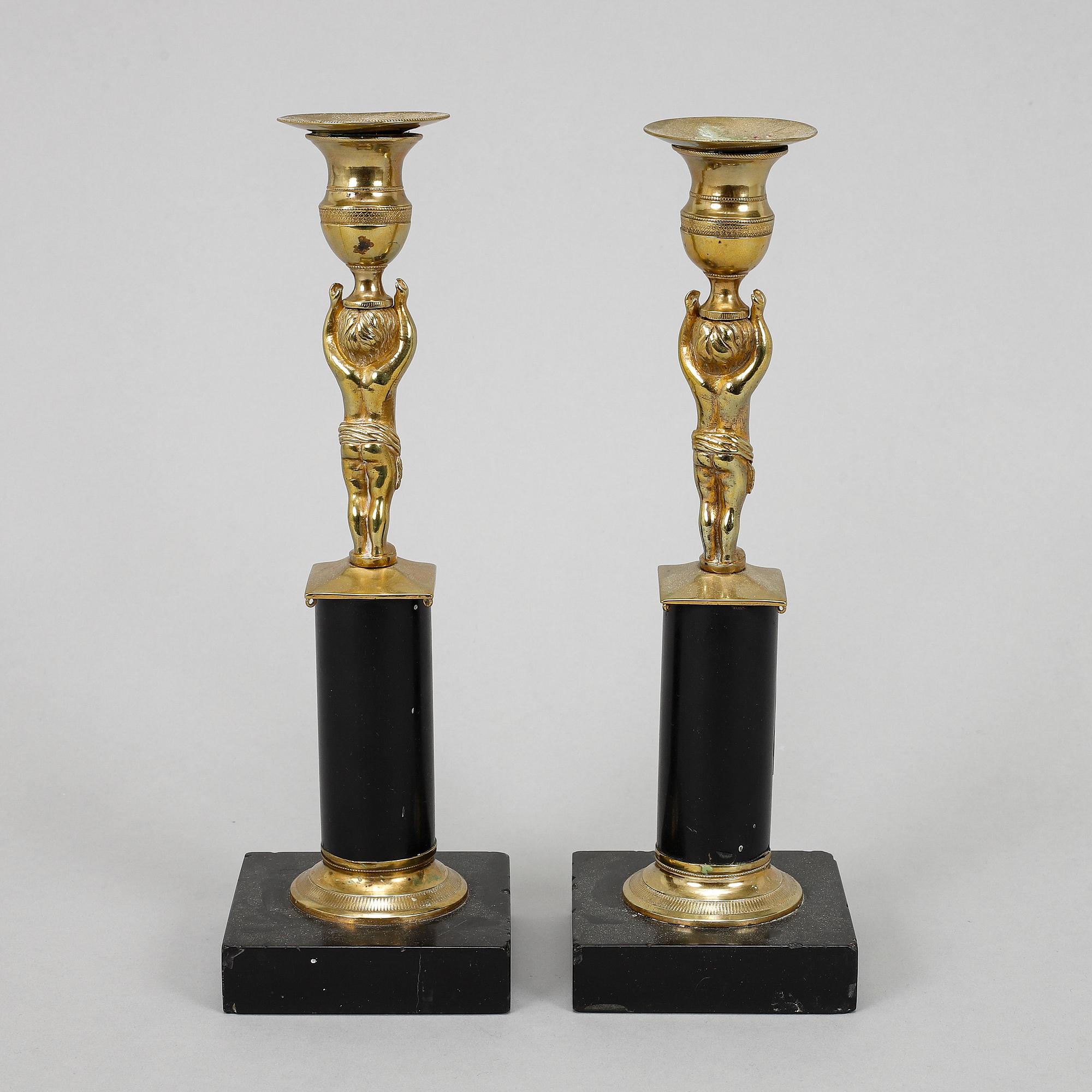 A pair of late gustavian candlesticks, circa 1800.