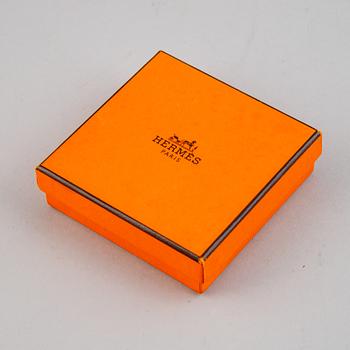 Hermès, a taupe leather 'Kelly Double' bracelet, size XS, 2013.