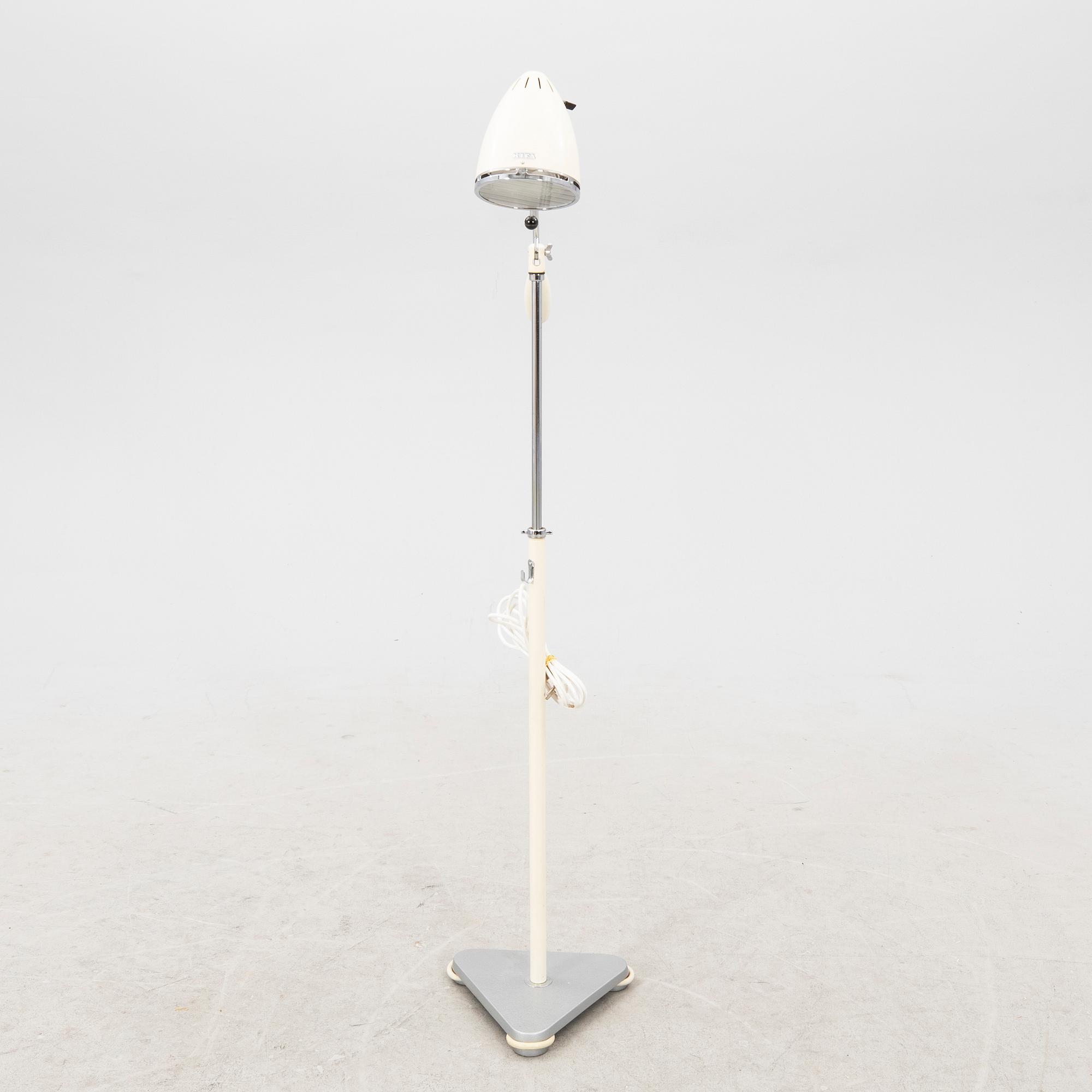 A mid 1900s industrial floor lamp.