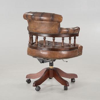 A desk chair in English style, made in the second half of the 20th century.