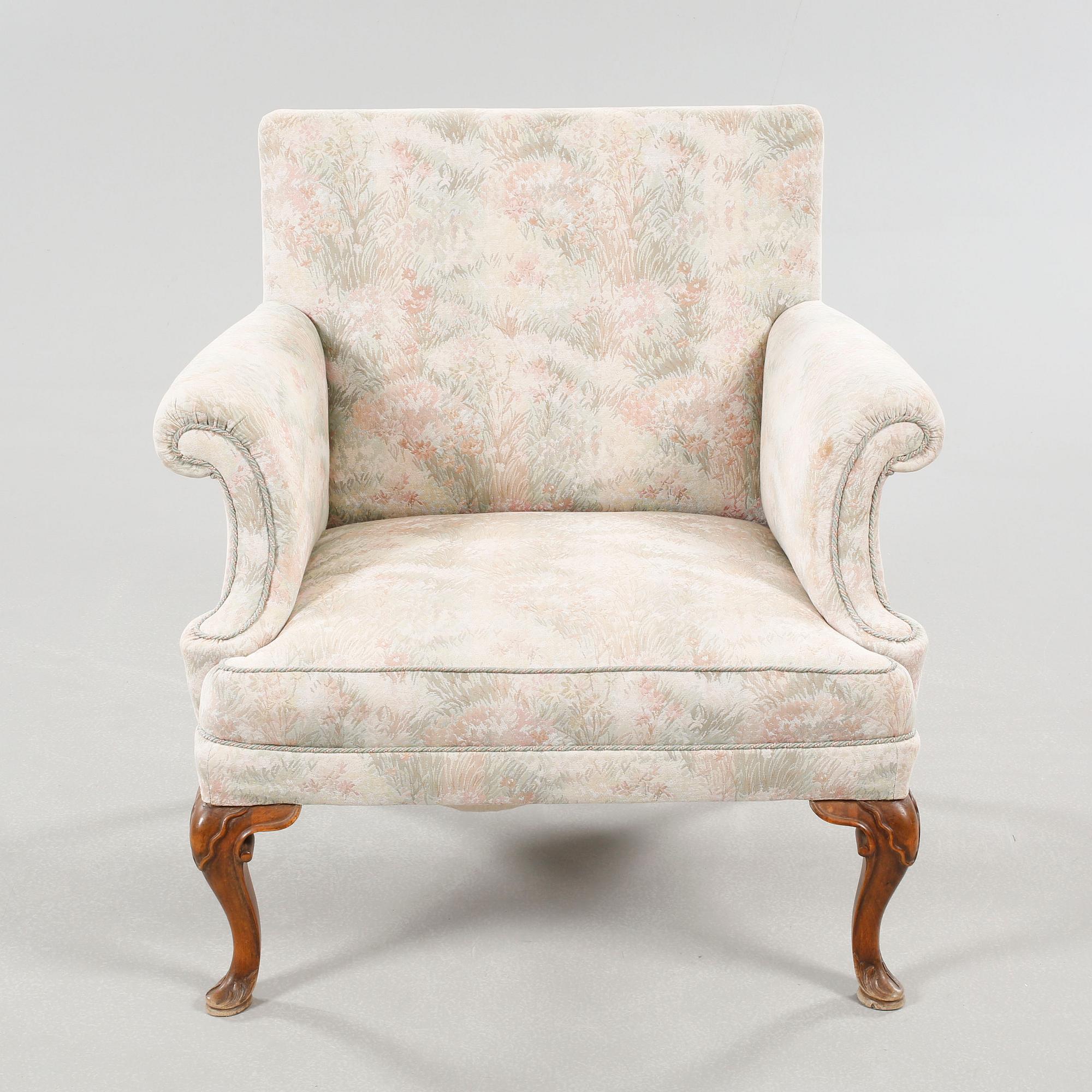 A Queen Anne style armchair, early 20th century.