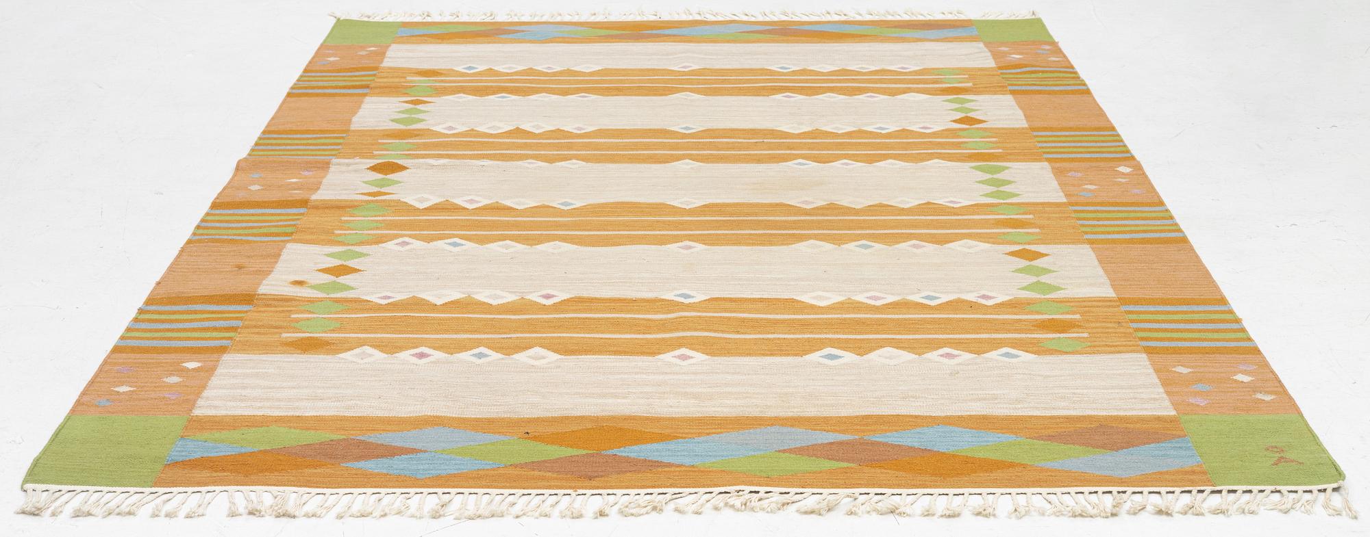 A flat weave carpet, signed Å, Axeco made in India, c. 280 x 196 cm.