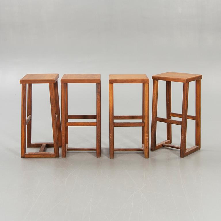 Four bar stools, 20th century.