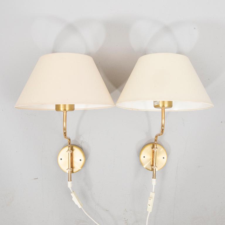 A pair of Belid brass wall lamps later part of the 20th century.