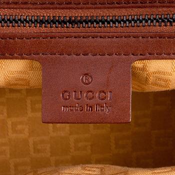 GUCCI, a brown leather doctors bag.