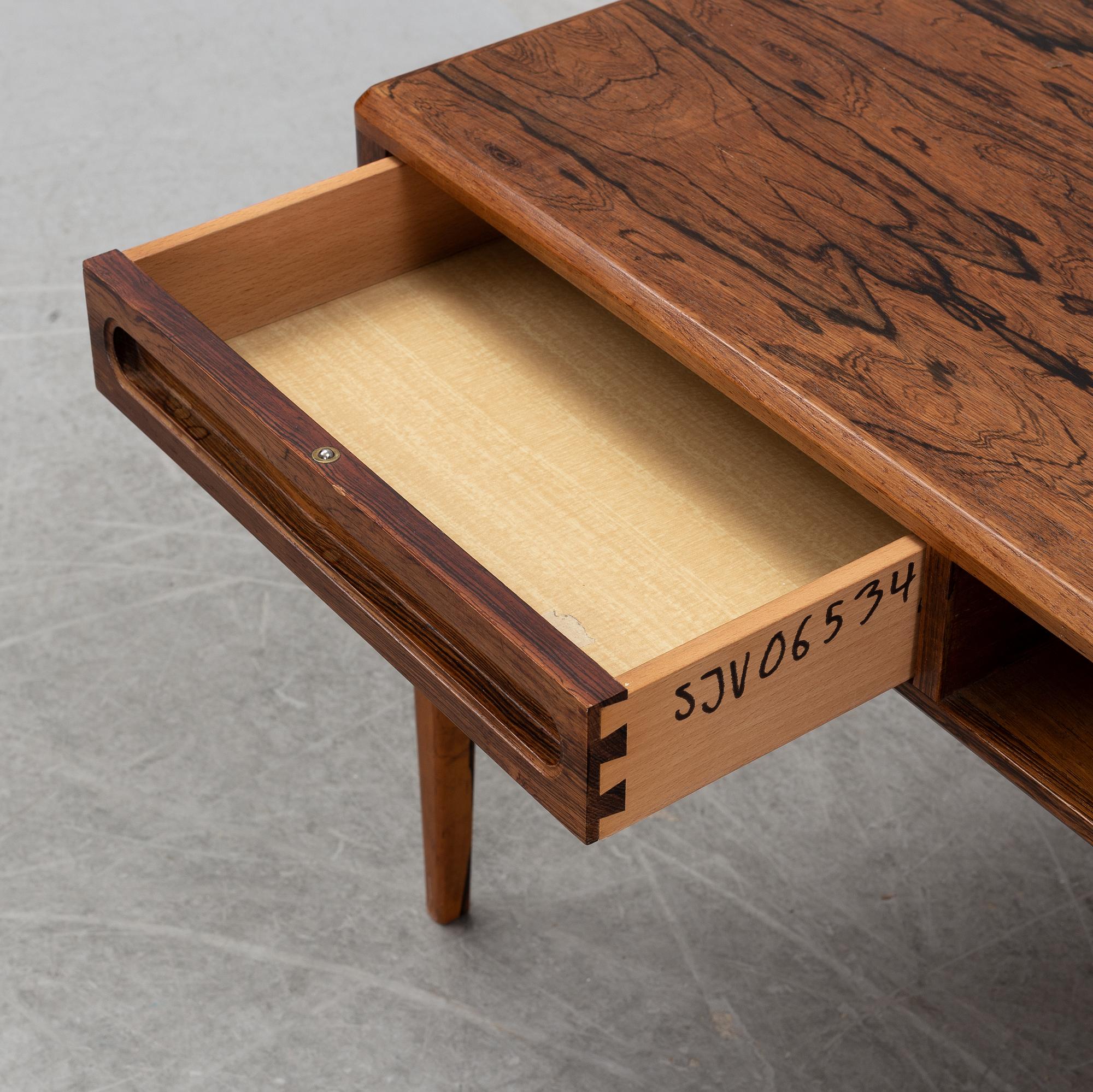 A 1960's rosewood coffee table.