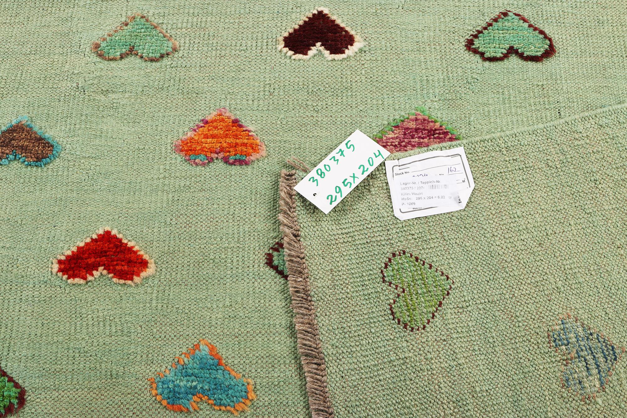 An Afghan kelim carpet, c. 295 x 204 cm.
