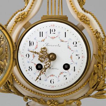 A FRENCH TABLE CLOCK, Louis XVI-style, first half of the 20th century.
