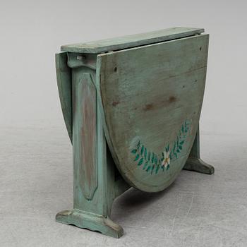 A 19th century gate leg table.