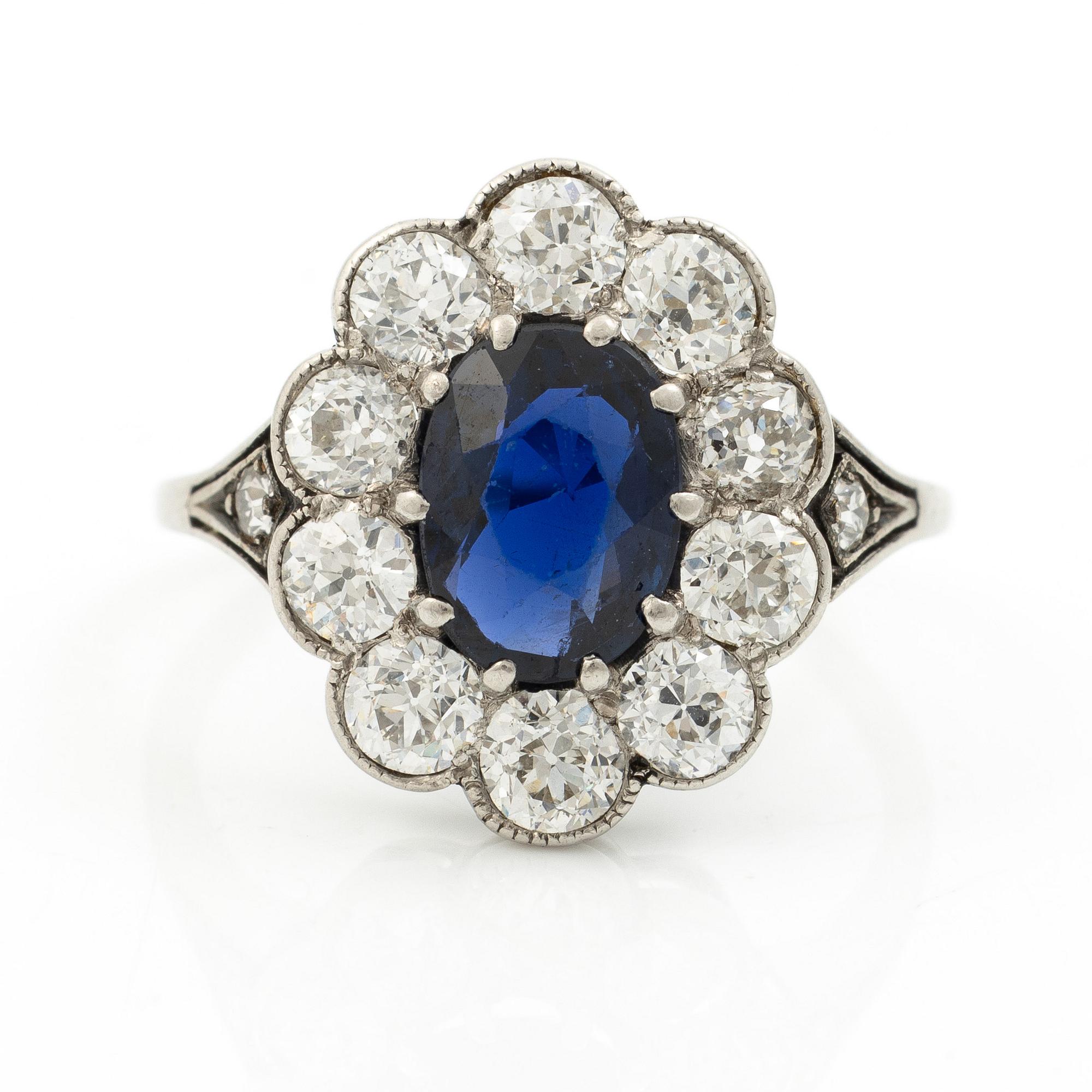 Carmose ring in platinum with sapphire and old-cut diamonds.