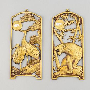 Two Chinese bronze wall reliefs, 20th century.