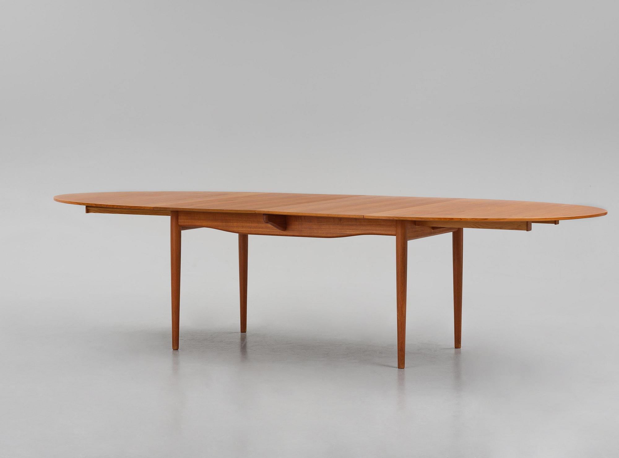 Finn Juhl, a teak dining table, Niels Vodder, Denmark, 1960s.