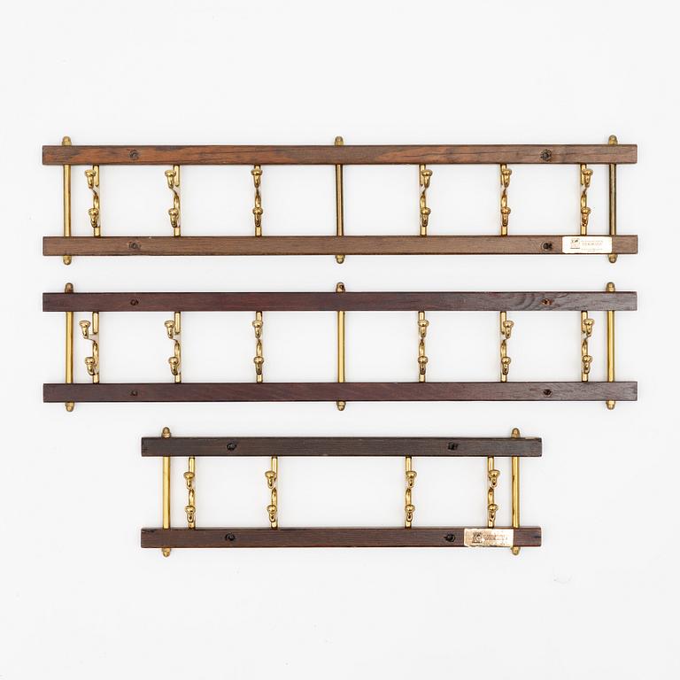 A set of three 'Dekorativ' coat hangers, Skoglunds metallgjuteri, Anderstorp, 1950's/60's.