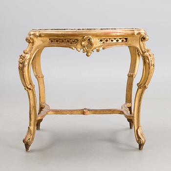 A late 19th century table in rococo style.