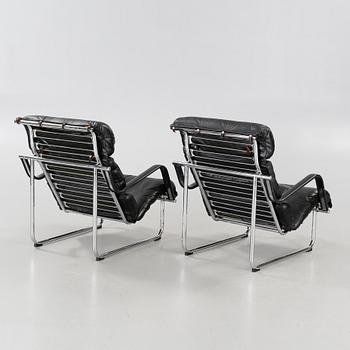 A pair of "Remmi 817H-1K" chairs, designed by Yrjö Kukkapuro in 1969, made by Haimi Oy or Avarte Oy.