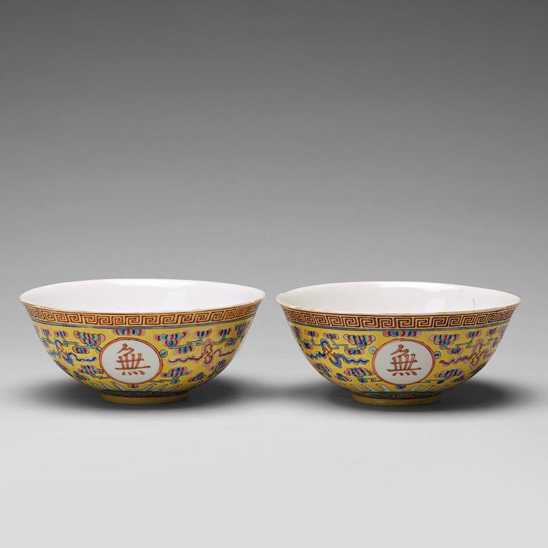 A pair of yellow glazed bowl, Qing dynasty with Guangxu mark in red.