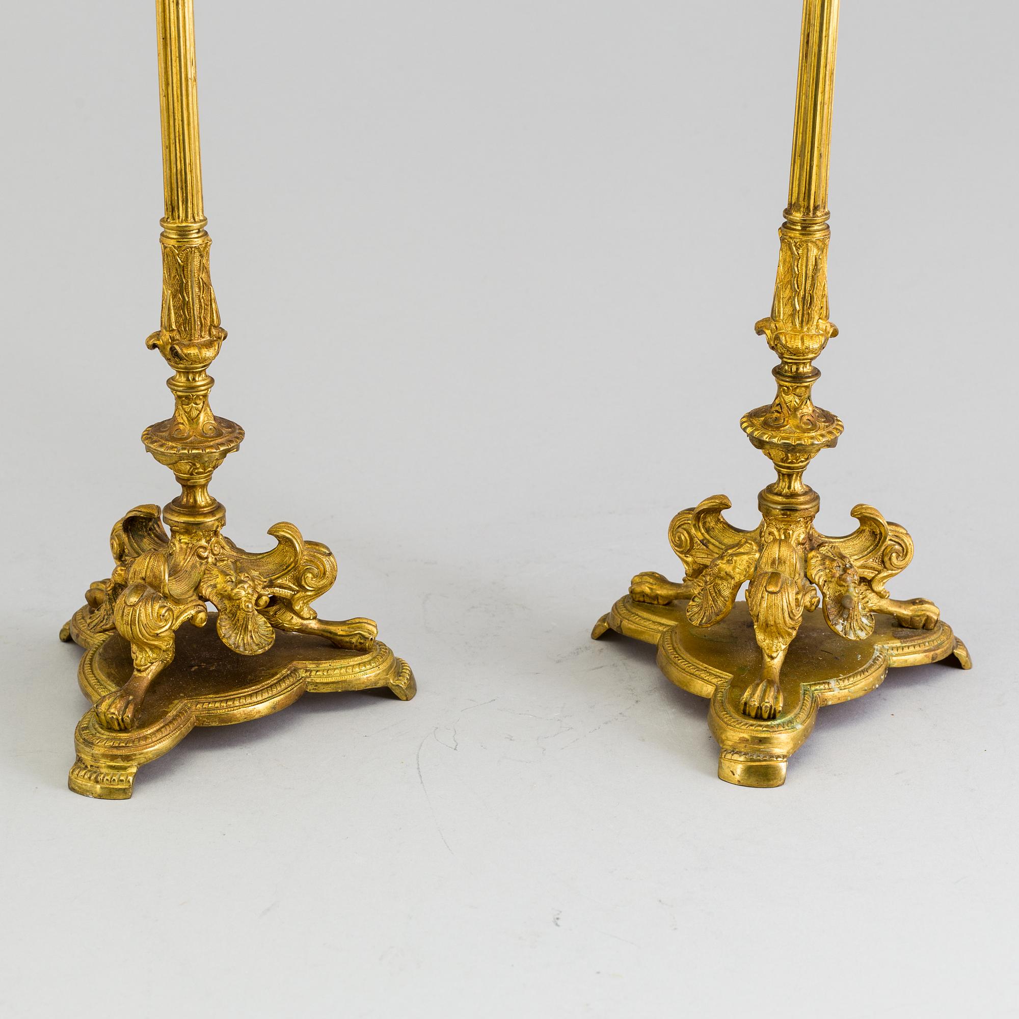 A pair of neorenaissance candelabras, about 1900.