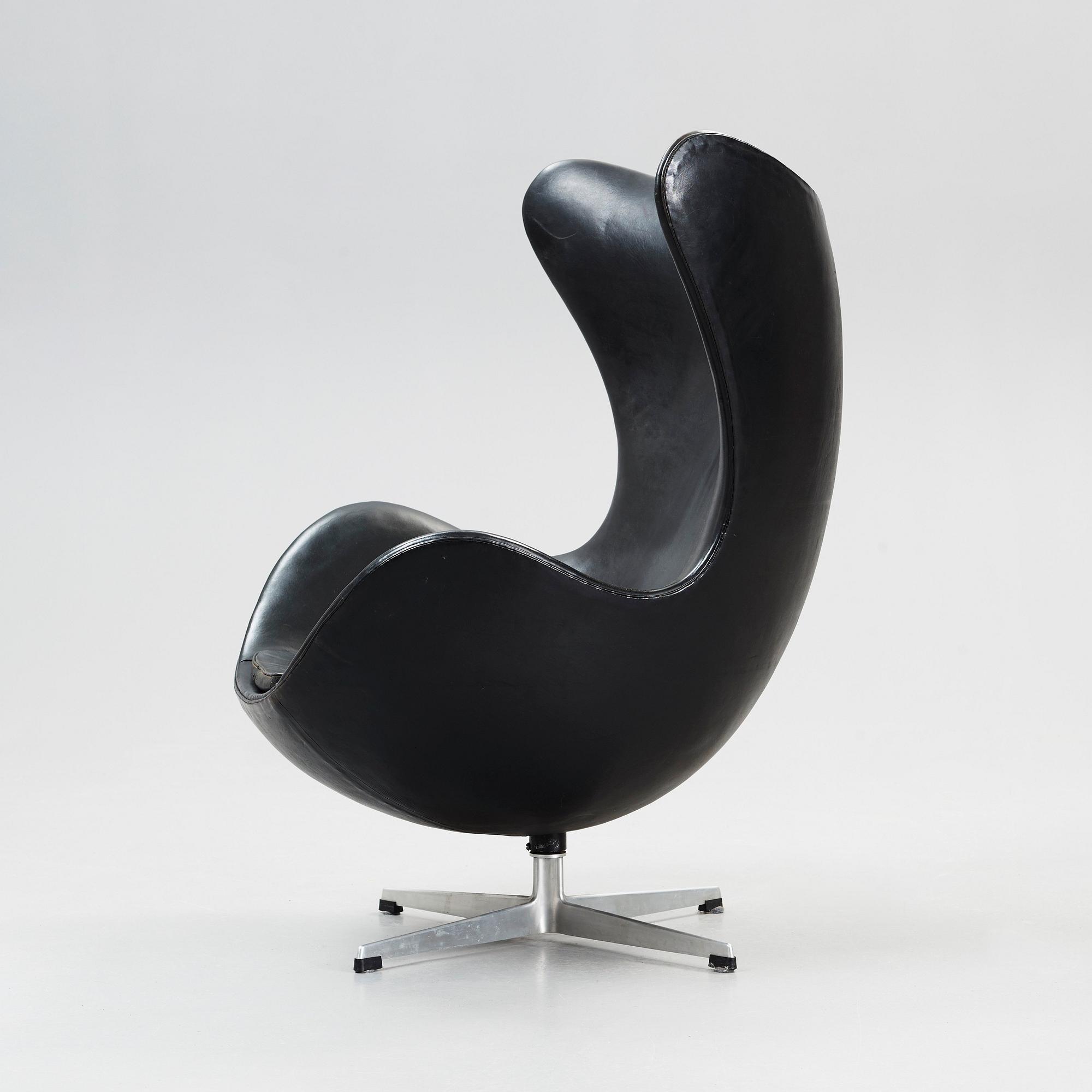 An Arne Jacobsen black leather 'Egg' chair, Fritz Hansen, Denmark 1964.
