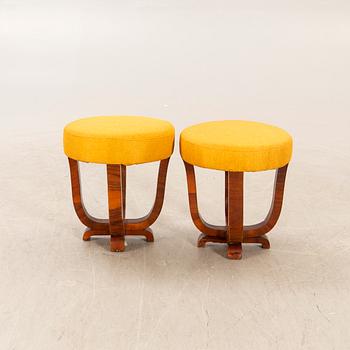 a set of two Art Deco walnut stools first half of the 20th century.