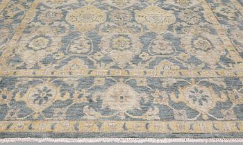 An oriental carpet, ca 425 x 300 cm.