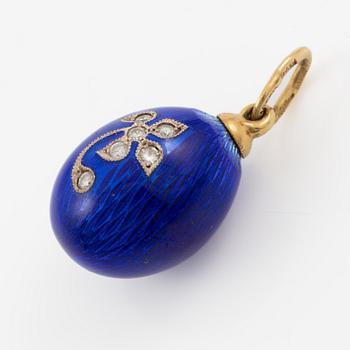 A W.A. Bolin pendant in the form of an egg, 18K gold and silver with enamel, set with round brilliant-cut diamonds.