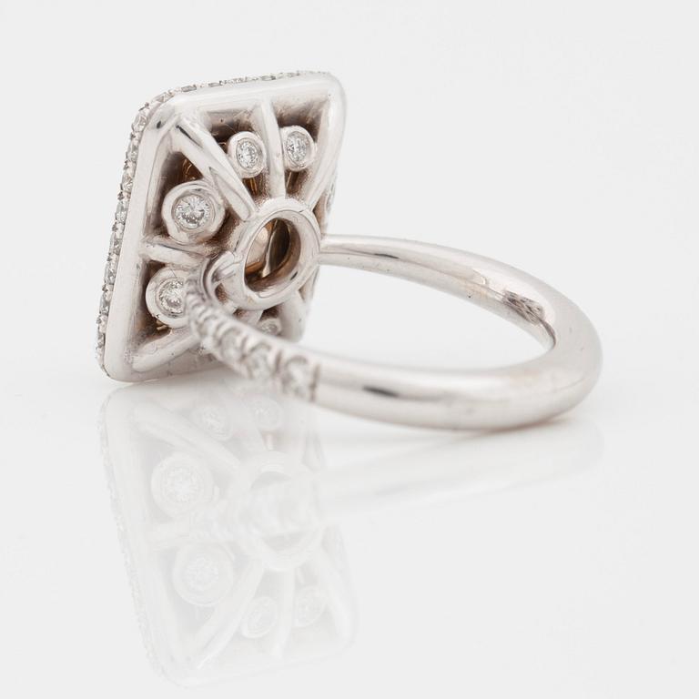 A 3.02 ct radiant-cut Fancy Yellow/VVS2 ring. Certificate from HRD.