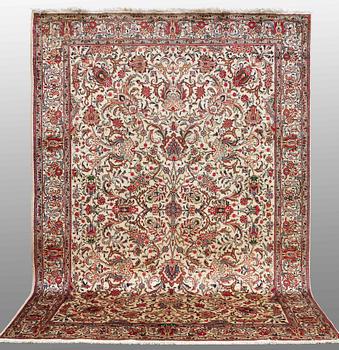 A CARPET, Tabriz, signed, ca 338 x 254 cm.