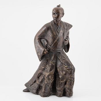 A large Japanese sculpture of a Samurai, 20th Century.