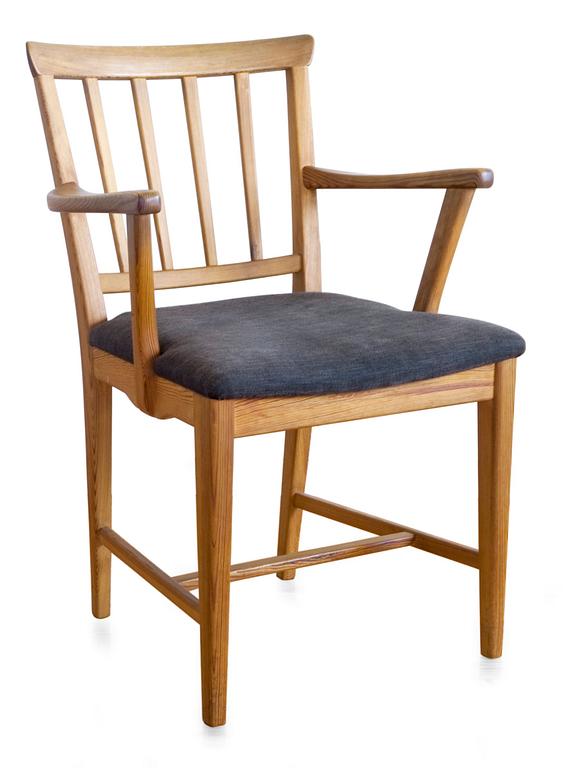 A PINE EASY CHAIR,