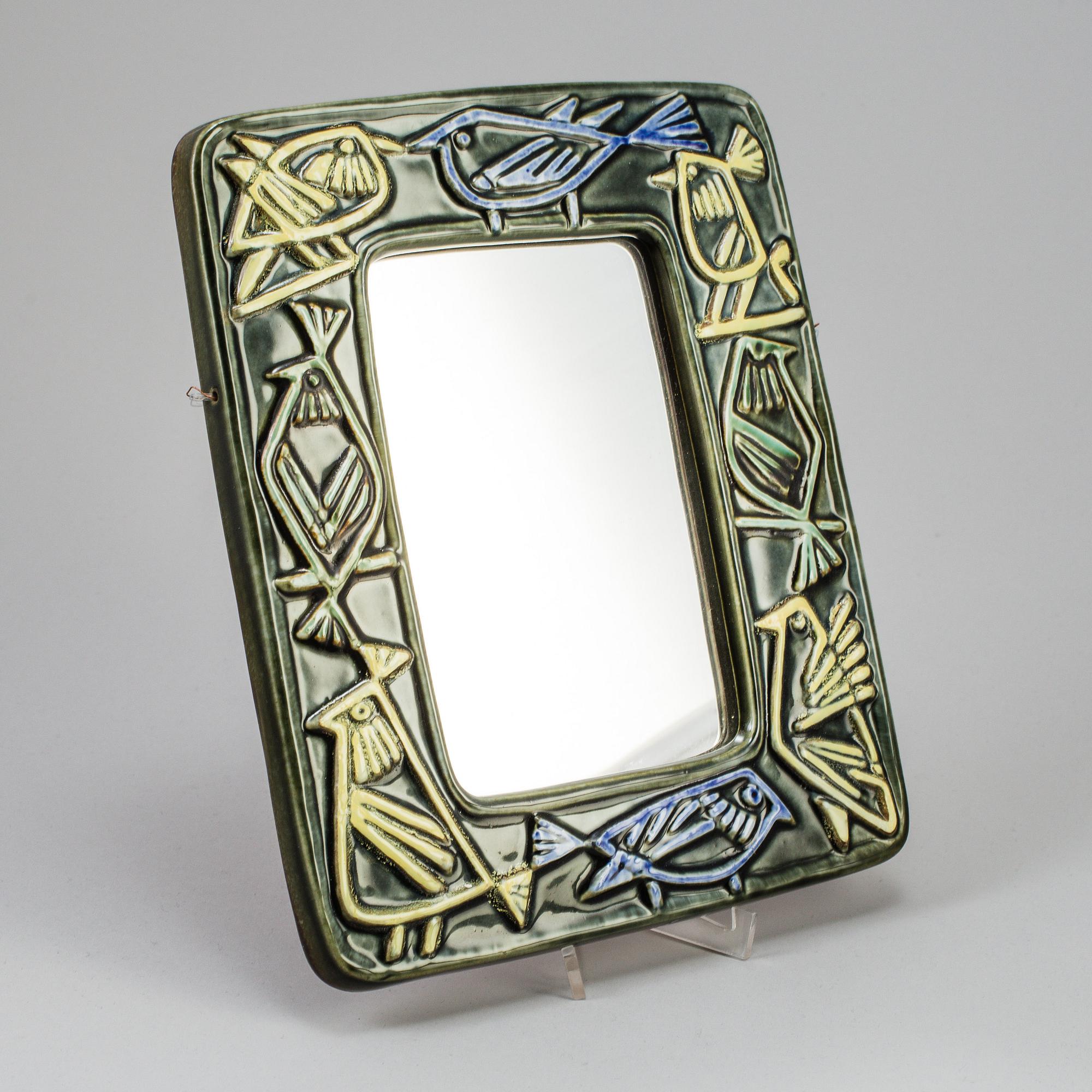 A stoneware mirror by Lisa Larson, Gustavsberg.
