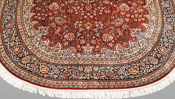 A carpet, silk Kashmir, ca 280 x 184 cm.