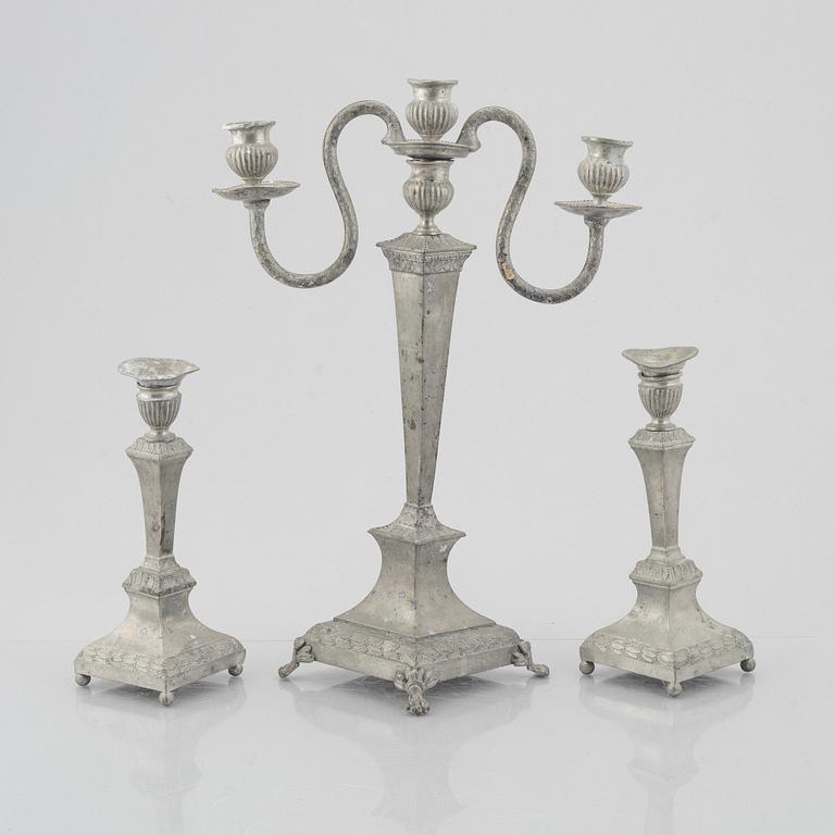 Candelabrum and two candlesticks, tin, by Nils Justelius and Niclas Anström, Eksjö and Växjö, first half of the 19th century.