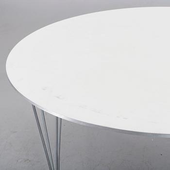A TABLE BY BRUNO MATHSSON, PIET HEIN & ARNE JACOBSEN FOR FRITZ HANSEN.