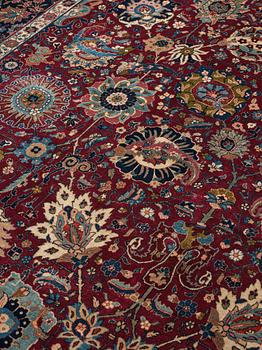 A carpet, semi-antique Tabriz, ca 413,5 x 328,5 cm.