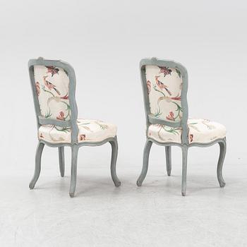 A painted  pair of rococo chairs, mid 18th Century.