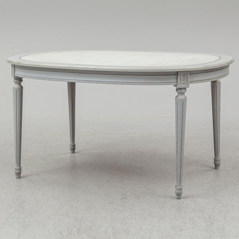 A dining table and four chairs, gustavian style, late 20th century.