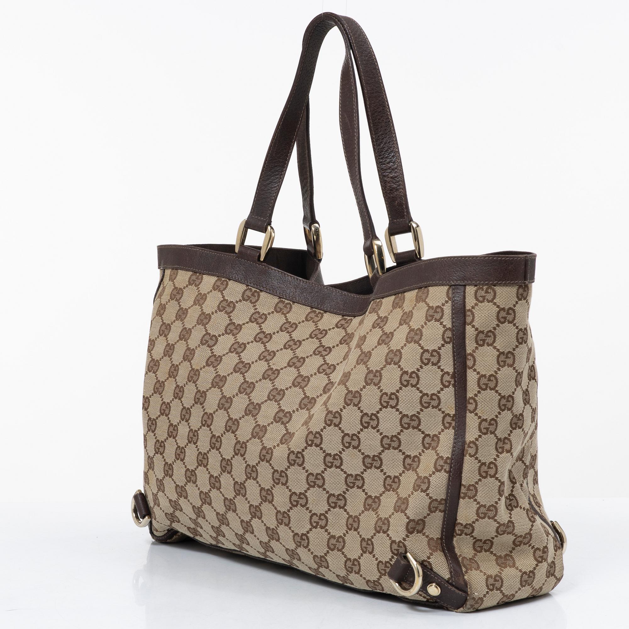Gucci, a canvas and leather bag.