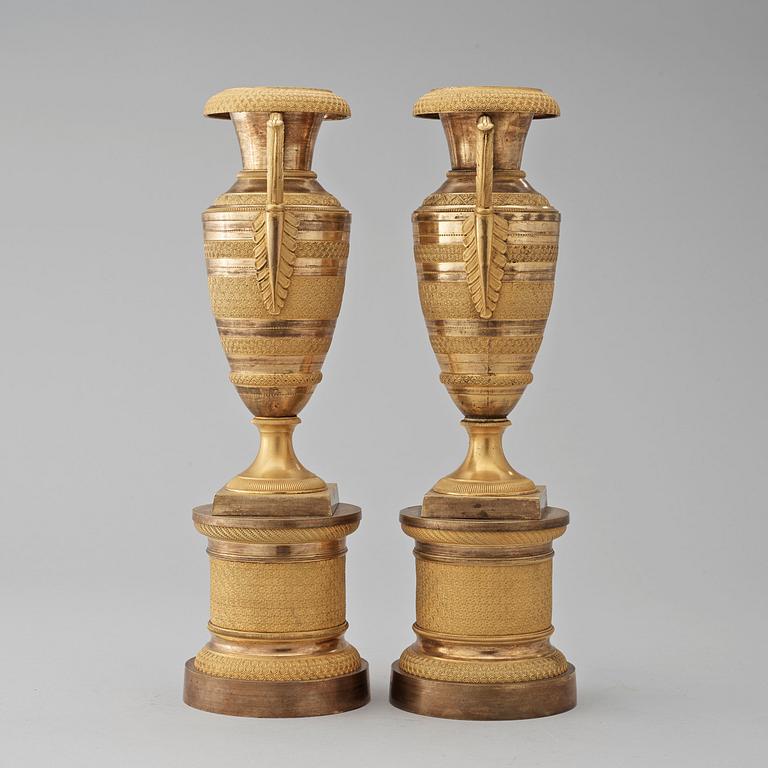 A pair of French Empire early 19th century urns.