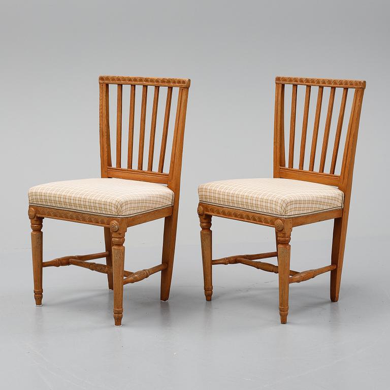 A pair of gustavian chairs, early 19th century.