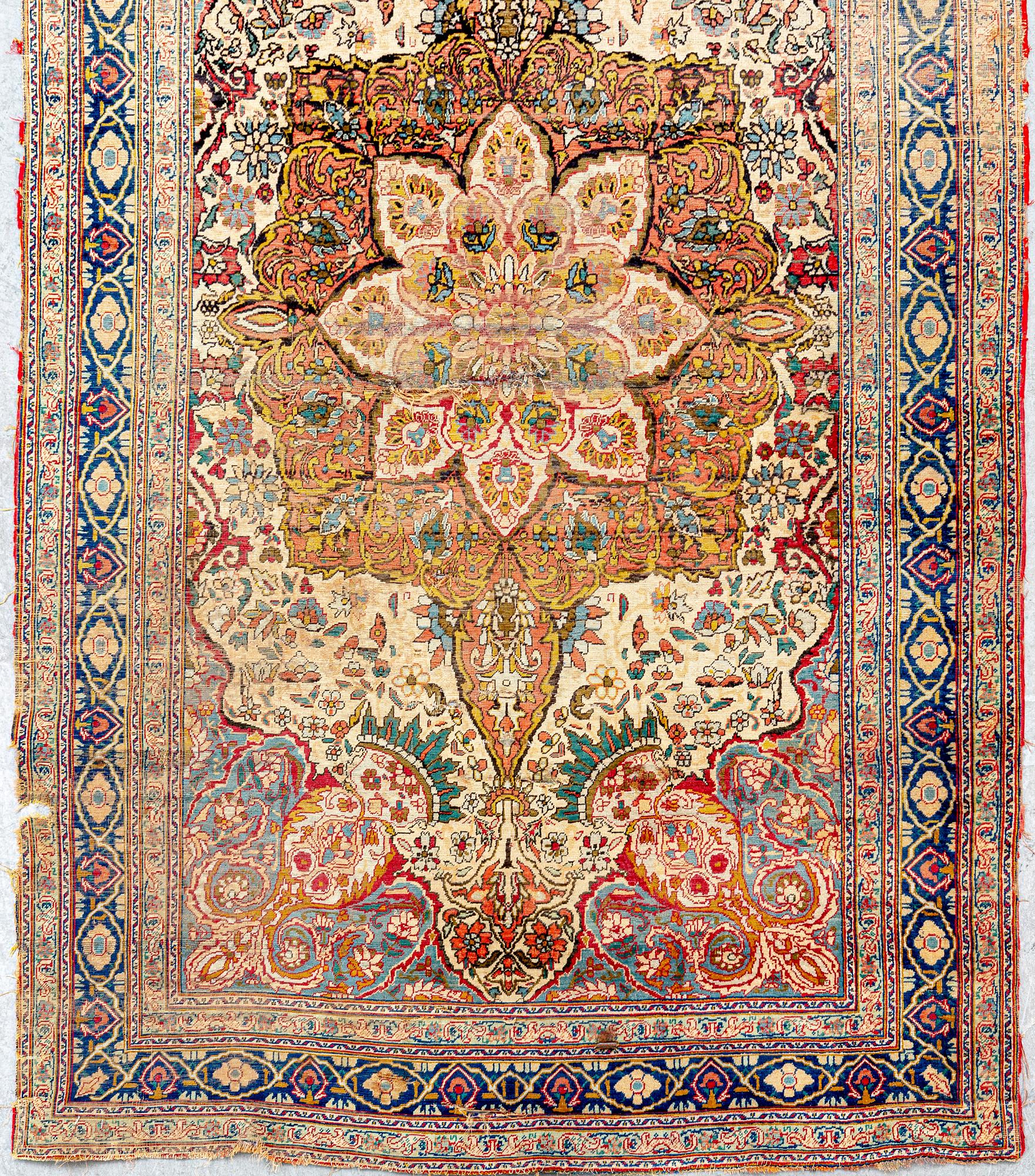 An antique Turkish /Hereke) signed carpet ca 200x121 cm.